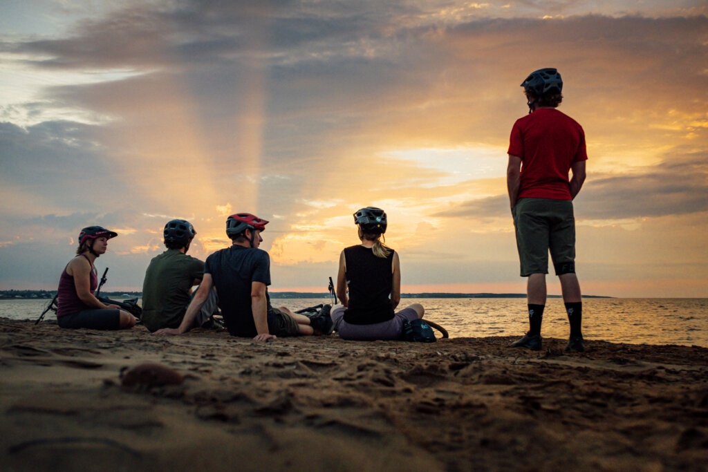 The whole crew enjoying an incredible sunset at Robinsons Island in Prince Edward Island